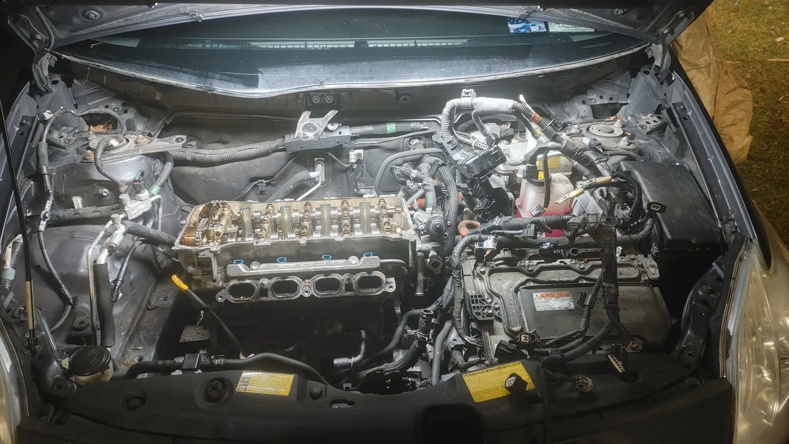 Toyota Prius head gasket replacement in progress with engine disassembled