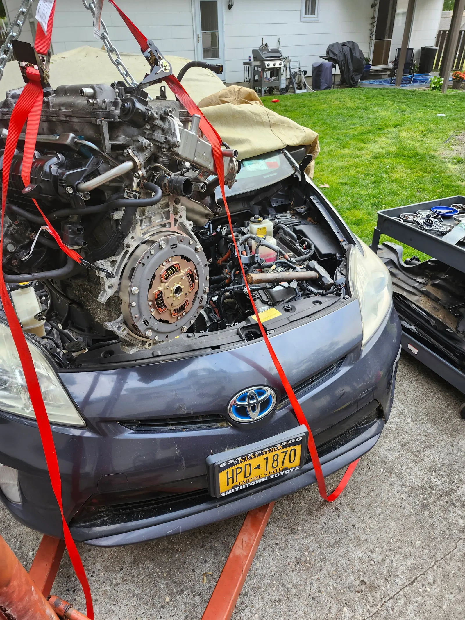 Engine removal with hoist — major repair in progress